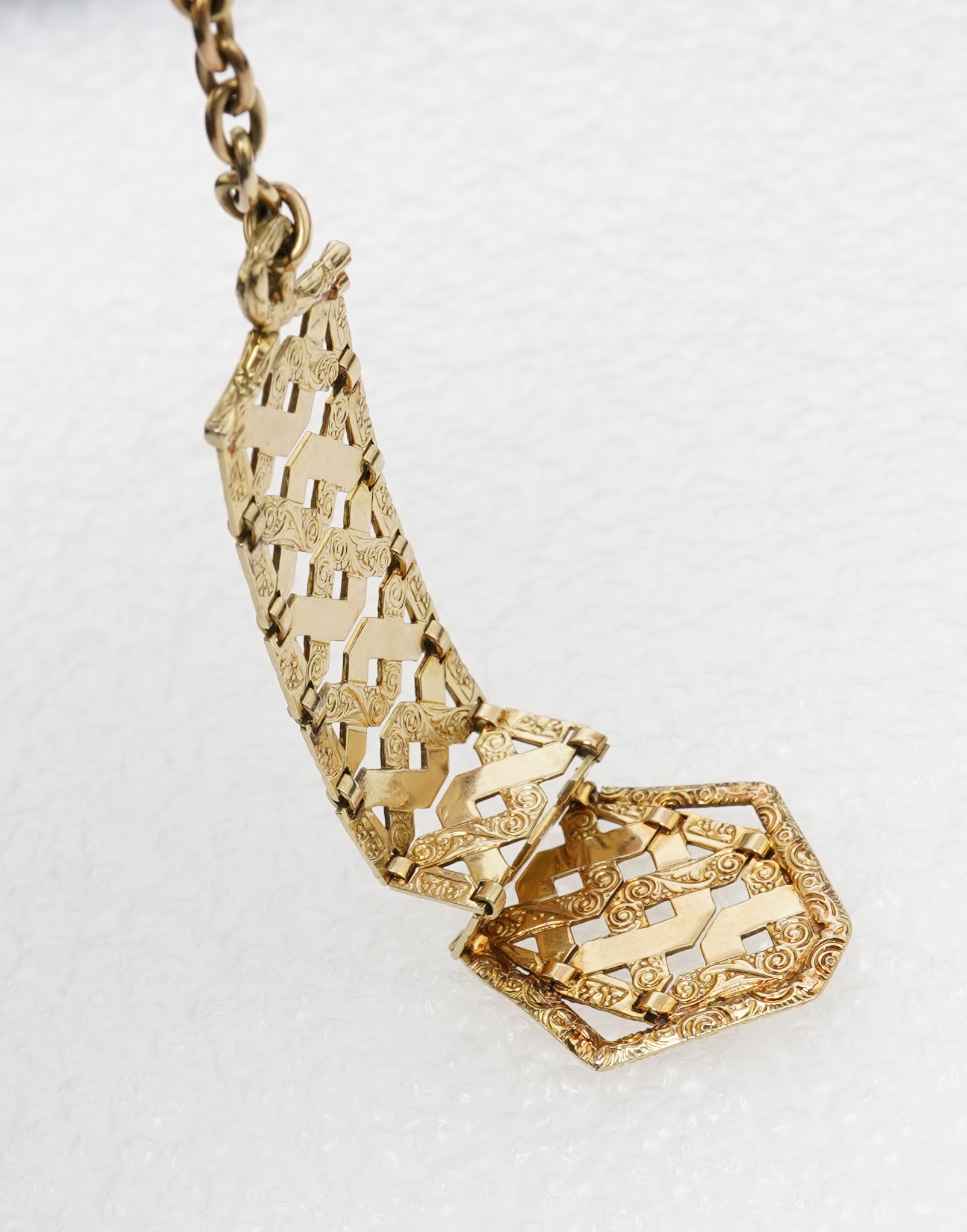 An unusual gold pendant, early 20th century